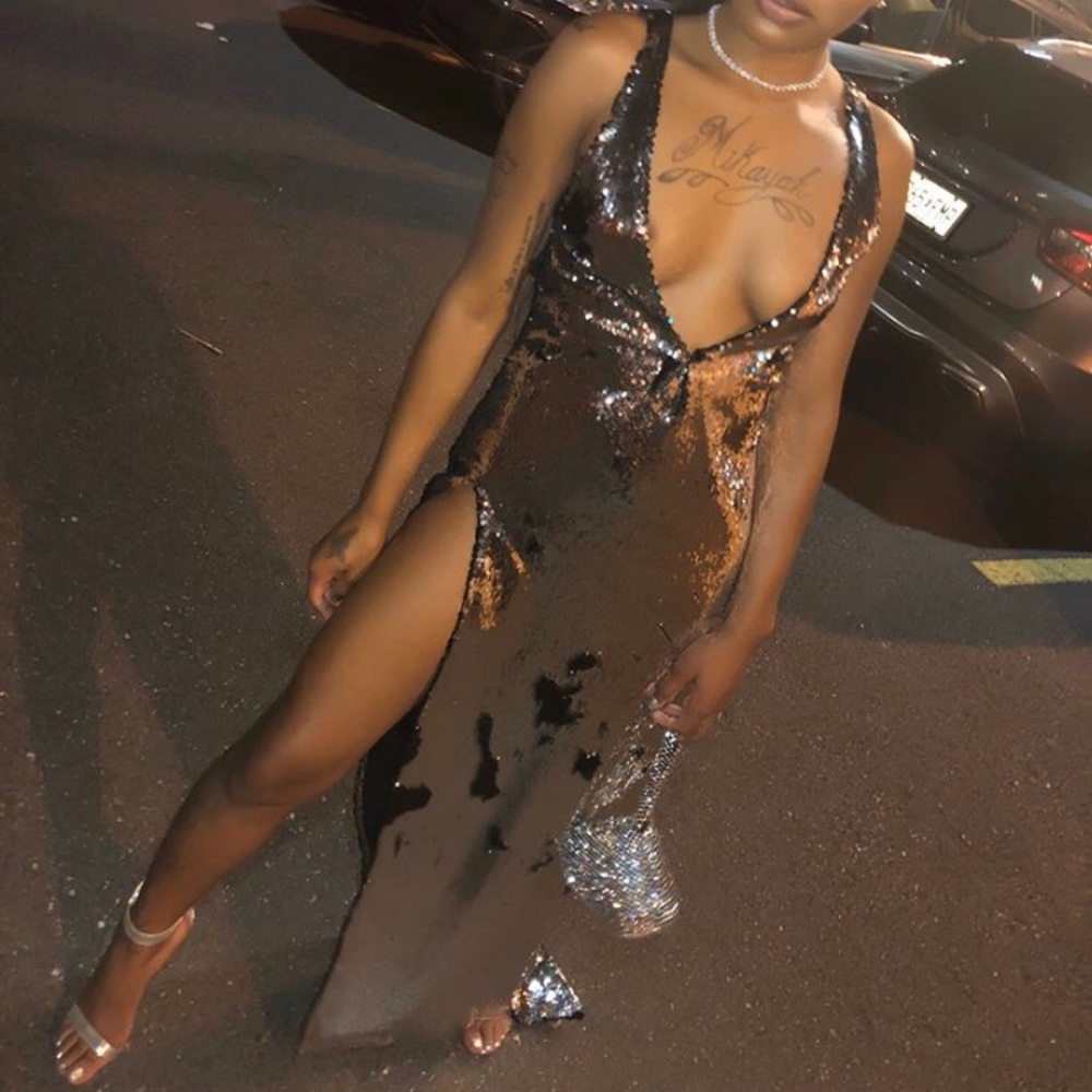 Reversible sequin deep V cut front and back.